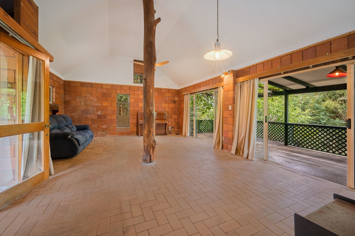 Living area opening onto the covered verandah at 35/65 Kilcoy Lane, Conondale