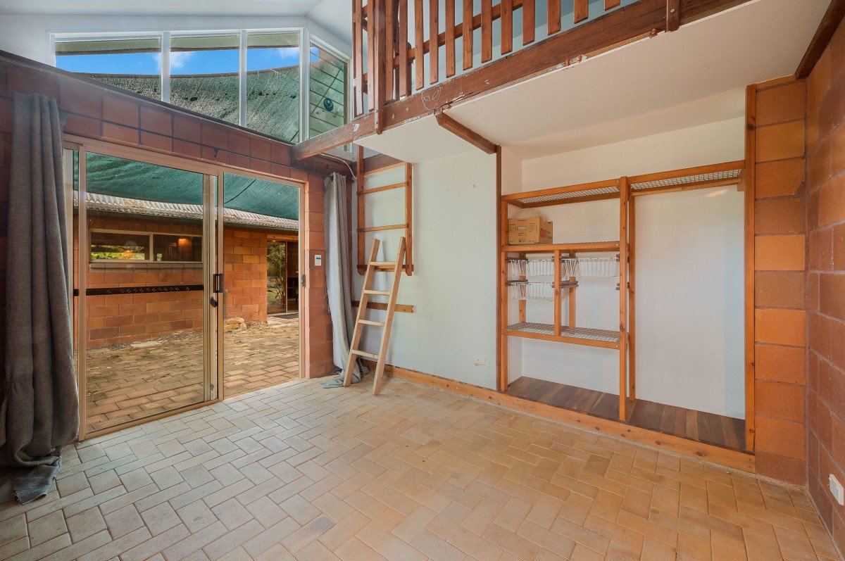 Bedroom with timber floor and built-in wardrobe at 35/65 Kilcoy Lane, Conondale