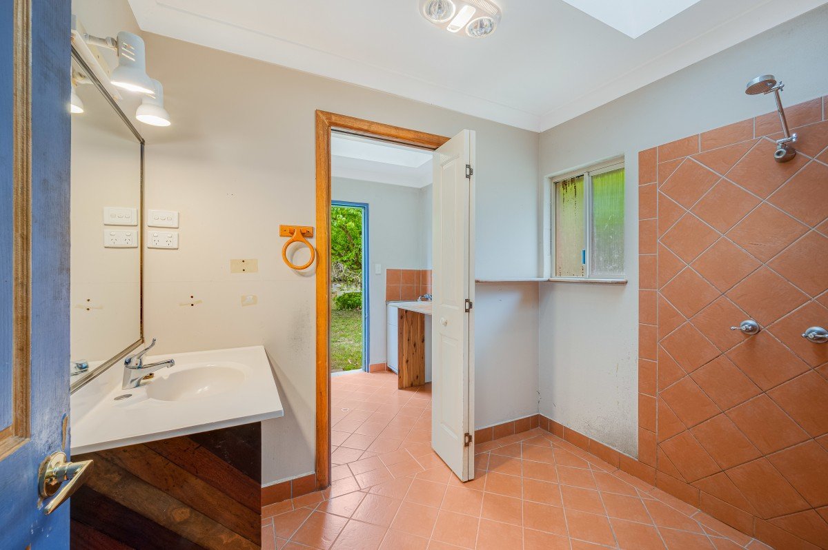 Bathroom and adjoining doorway at 35/65 Kilcoy Lane, Conondale